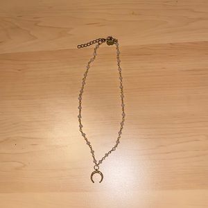Crescent moon and beaded necklace